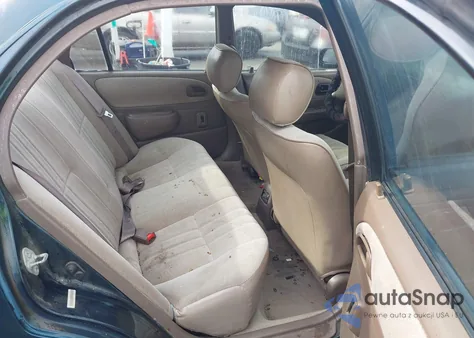 1997 Toyota Corolla Ce z USA, uszkodzony, nr VIN 1NXBA02E1VZ657707